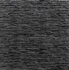 Retro vintage red bike on cobblestone street. Pearl Black Exterior Stone Cladding Stone Wall Cladding