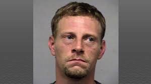 Man arrested after threatening man with machete