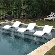 Whether it's on the pool deck or the patio, a chaise lounge chair can take relaxation to the next level. In Water Pool Lounge Chairs You Ll Love In 2021 Visualhunt