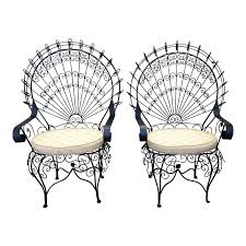 A patio is just a yard without patio furniture. Pair Of Wrought Iron Peacock Chairs Design Plus Gallery