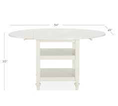 Extendable tables are a versatile piece to have around your home. Shayne Round Drop Leaf Kitchen Table Pottery Barn