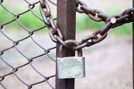 They don't block views and they let the breeze float through your property. Lock On A Chain Link Security Fence Stock Photo Picture And Royalty Free Image Image 19664963