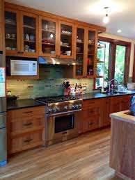 The stained oak cabinets perfectly match the backsplash art tiles. Craftsman Style Kitchen Backsplash Collection 683 Best Craftsman Kitchens A A A Images On Pin Kitchen Design Kitchen Renovation Craftsman Style Kitchen