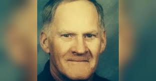 John M. Mathews Obituary