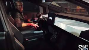 The tesla cybertruck made a big splash when it was first introduced, but as it gets closer get all the latest news on tesla's pickup truck at edmunds, including pricing, photos and detailed expert analysis. Tesla Cybertruck Video Go For A Ride Inside The Minimalist Cabin