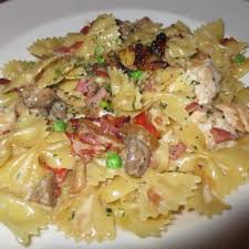 Add the roasted garlic paste to the cream sauce along with the reserved pan drippings from the roasted chicken and whisk to incorporate well. Farfalle With Chicken And Roasted Garlic Yelp