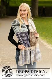 Ornamental band scraf, strip or belt worn around the waist over the shoulders. Urban Autumn Scarf Drops 204 40 Free Knitting Patterns By Drops Design