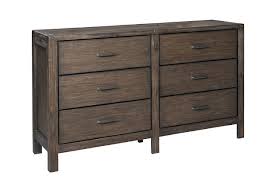 From dressers, media chests and bedroom benches, ashley's got the polished look that will keep everything you need safely tucked away. Dellbeck Queen Canopy Bed With 4 Storage Drawers With Dresser Ashley Furniture Homestore