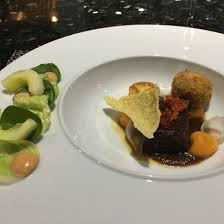 The live cooking restaurants allow guests to select from a nightly themed menu ranging from caribbean, italian, mexican and even barbeque inspired entrees and have their meal prepared. Our Menu Picture Of The Kitchen Table Aruba Tripadvisor