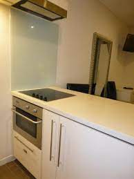 Cooking on the stove is a little different than cooking on the grill. Built In Oven And That S A Dishwasher Drawer Below Four Burner Electric Stove Top Set In Picture Of Oaks Melbourne On Collins Hotel Tripadvisor