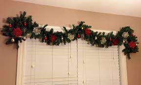 Christmas Garland Over The Dining Room Window With Glitter Snowflakes And Small Pl Christmas Decorations Garland Christmas Window Decorations Christmas Garland