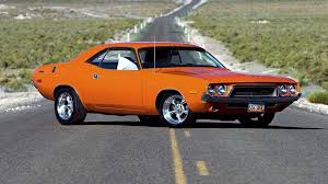 Orange Muscle Car On The Road Classic Cars Muscle American Muscle Cars Dodge Challenger