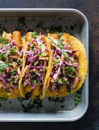 In the bowl of a food processor, combine the avocado, yogurt, lime juice, cilantro, salt and water, and process until smooth and creamy. Easy Fish Tacos With Citrus Greek Yogurt Slaw Nutmeg Nanny