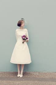 A full length wedding dress isn't for everyone, and if the thought of a long flowing wedding gown sends shivers down your spine, then a short wedding dress could be for you. Sussex Based Vintage Style Photographer Quirky Fun Wedding Bride Posie Country Flowers Bouque 1960s Wedding Dresses Short Bride Dresses Short Wedding Dress