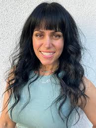 Can someone please make the background a little less busy and/ or make the  picture into a silhouette please 😊