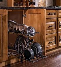 Storage Solutions Details Tiered Pan And Lid Storage Pull Out Kraftmaid Kraftmaid Kitchens Kitchen Storage Solutions Kitchen Innovation