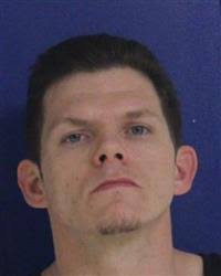 Police say drugs, stolen items found in home