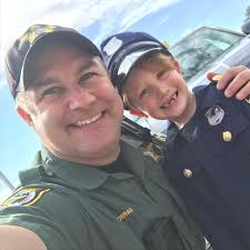 It's Career Day at @liza_jackson_preparatory and School Resource Officer  Deputy Cullen Coraine has plenty of backup! #SRO #lawenforcement #deputy  #uniform #schoolsafety #schoolgirl