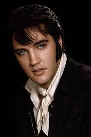 Elvis - “He was only forty two.” Those words moved quietly across radios  and television screens on the morning of August 16, 1977. Outside  Graceland, the sun rose like any other summer
