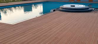 Decor in blue and gray unify this home's outdoor spaces that include an elevated deck, outdoor kitchen and pool area with a pool house. Wooden Deck Flooring Wpc Decking Tiles Suppliers Manufacturers Exporters