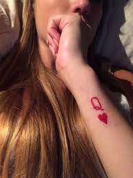 Queen Of Hearts Tattoo Delicate Red On Outer Wrist Queen Of Hearts Tattoo Cool Wrist Tattoos Wrist Tattoos For Guys