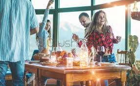 With a unique party theme, your guests will be in awe while having fun at your dinner party. Happy Friends Dancing Home Dinner Party Millennials People Having Fun Stock Photo Crushpixel
