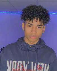 Black boys with curly hair. 15 Best Hairstyles For Teenage Guys With Curly Hair