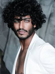 Handsome men with long curly hair. Exotic Foreign Men