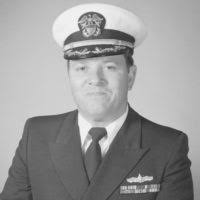 CAPT Robert F. Baril assumes command of the destroyer tender USS CAPE COD  (AD-43) during commissioning ceremonies