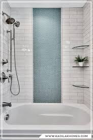 Go for mosaic glass tiles in a recurring border, or use a border of black tiles to divide a white and brown mosaic tile creation, breaking up the wall space. Shower Tile Inspiration Ideas Design Bathroom Interior Design Bathroom Remodel Tile Bathroom Remodel Shower