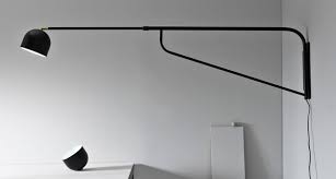 This one follows the industrial lighting trend of showcasing an exposed bulb. 14 Modern Long Swing Arm Wall Lamps Vurni