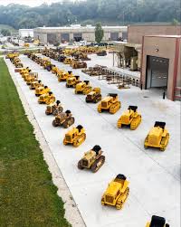 Image result for Caterpillar Yellow 1995 Fleet