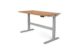 Rectangular black standing desks with adjustable height. The Best Standing Desk Converters Will Save Your Twisted Back Gq