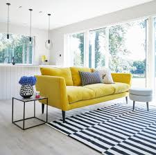 Yellow needs to be used delicately. That Yellow Velvet Sofa Sophie Robinson