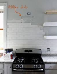 wall hood with tile gap interiors black cooker and extractor hood with white tiled wall black cooker white tiles wall tiles