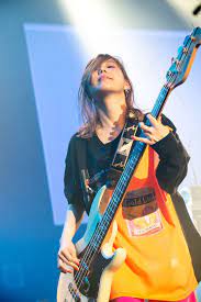 tomomi ogawa of scandal scandal japanese band poses guitar girl