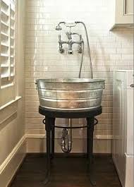 Galvanized Bucket On Stand With A Hand Held Shower Sounds Like A Good Idea For A Laundry Room And Or A Bathroom Sink Laundry Room Sink Laundry Room Home Hacks