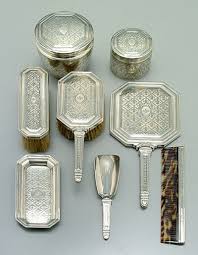 A set dresser in drama (theater, film etc.) prepares the set with props and furniture to give it correct appearance and make sure each item is in correct position for each performance. 542 Tiffany Sterling Silver Dresser Set Oct 23 2004 Brunk Auctions In Nc Antique Vanity Set Silver Dresser Dresser Sets