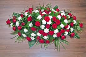 Send a red carnation bouquet today! Red Roses White Carnations Casket Spray Flowerandballooncompany Com
