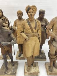 Seven 19th Century Indian clay dolls ...