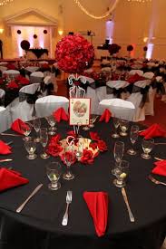 Top view of red spiced mulled wine with berries, anise, orange slices and cinnamon on wooden rustic table near fir branch, panoramic shot. Alice In Wonderland Playing Cards Weddingbee Photo Gallery Alice In Wonderland Wedding Wonderland Wedding Black And Gold Centerpieces