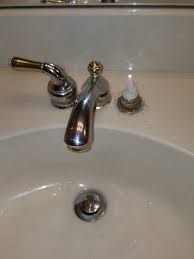 With the water safely turned off, you can now get into the meat of the project by removing the old faucet set. Moen Monticello Trying To Remove Bathroom Faucet Terry Love Plumbing Advice Remodel Diy Professional Forum