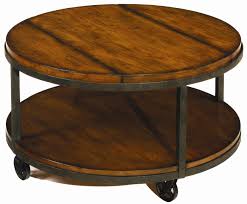 Baja Round Cocktail Table With Shelf And Wheels By Hammary At Sheely S Furniture Appliance Coffee Table With Wheels Coffee Table Wood Coffee Table