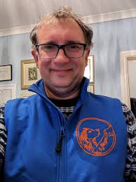 Billy Strings wears custom patchwork train bibs