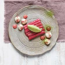 2 cups heavy cream, 1 cup whole milk, 1/4 teaspoon salt, 6 large eggs, 2/3 cup sugar, 2 tablespoons matcha (powdered japanese green tea), an ice cream maker. C Patricia Niven