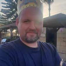 Images from the scene show a dark coloured car