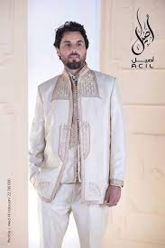 Costume Pour Homme Brode A La Main Avec Un Motif De Broderie Traditionnelle Tunisienne Pour Jebba Cool Hairstyles For Men Men Kaftan Fashion Design Drawings