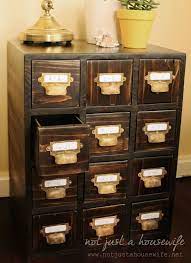 Place the staple in a location that will be covered by your hardware. How To Build A Card Catalog Stacy Risenmay Card Catalog Cabinet Card Catalog Furniture Diy