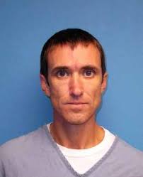 Armed home invasion suspect claims his innocence