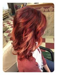 The asymmetrical cut adds more length to your hair and looks flattering on your face. 81 Red Hair With Highlights Ideas That You Will Love Style Easily